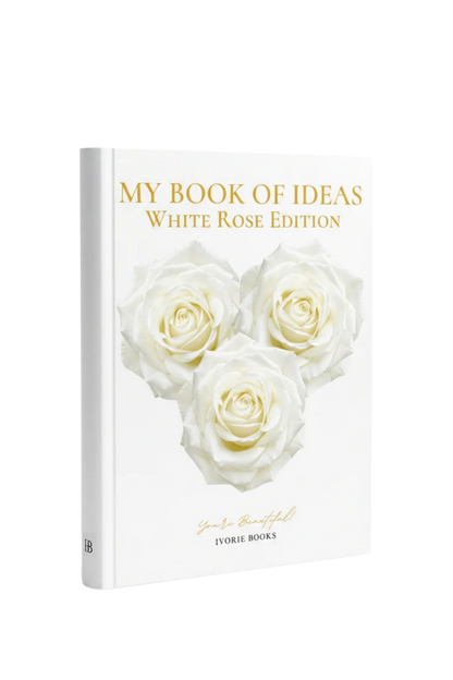 A hardcover book titled 'MY BOOK OF IDEAS White Rose Edition' with three white roses on the cover, photographed on a clean white background. The spine and cover show the brand name 'Ivorie Books'.
